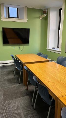 Meeting Room 2 with four tables and twenty chairs