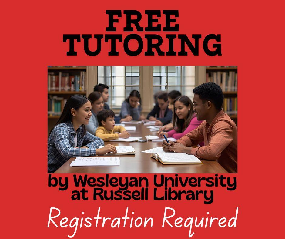 Image of kids and young adults working together at a table. 